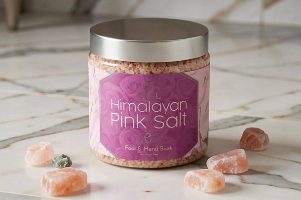 FASL Himalayan pink salt jar in the marble floor with some pink salt chunks around it